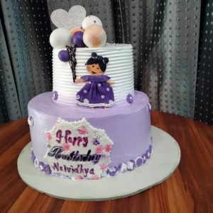 2 tier Pretty girl cake with baloons